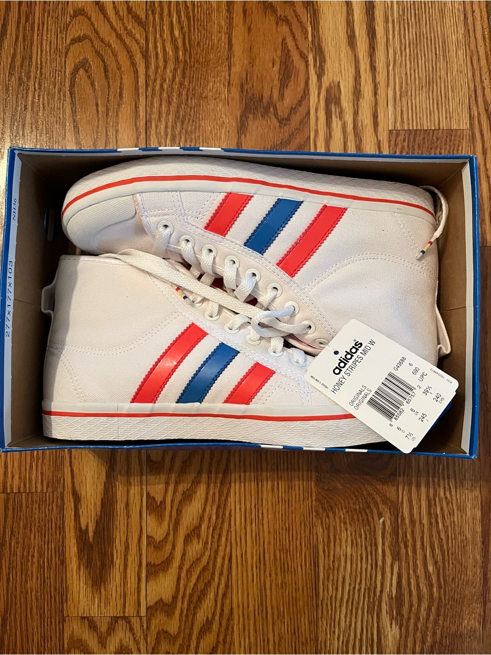 Adidas Mid-Top Sneakers with Red and Blue Stripes